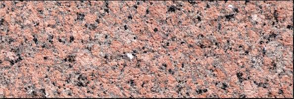 Texture of wall of polished pink granite